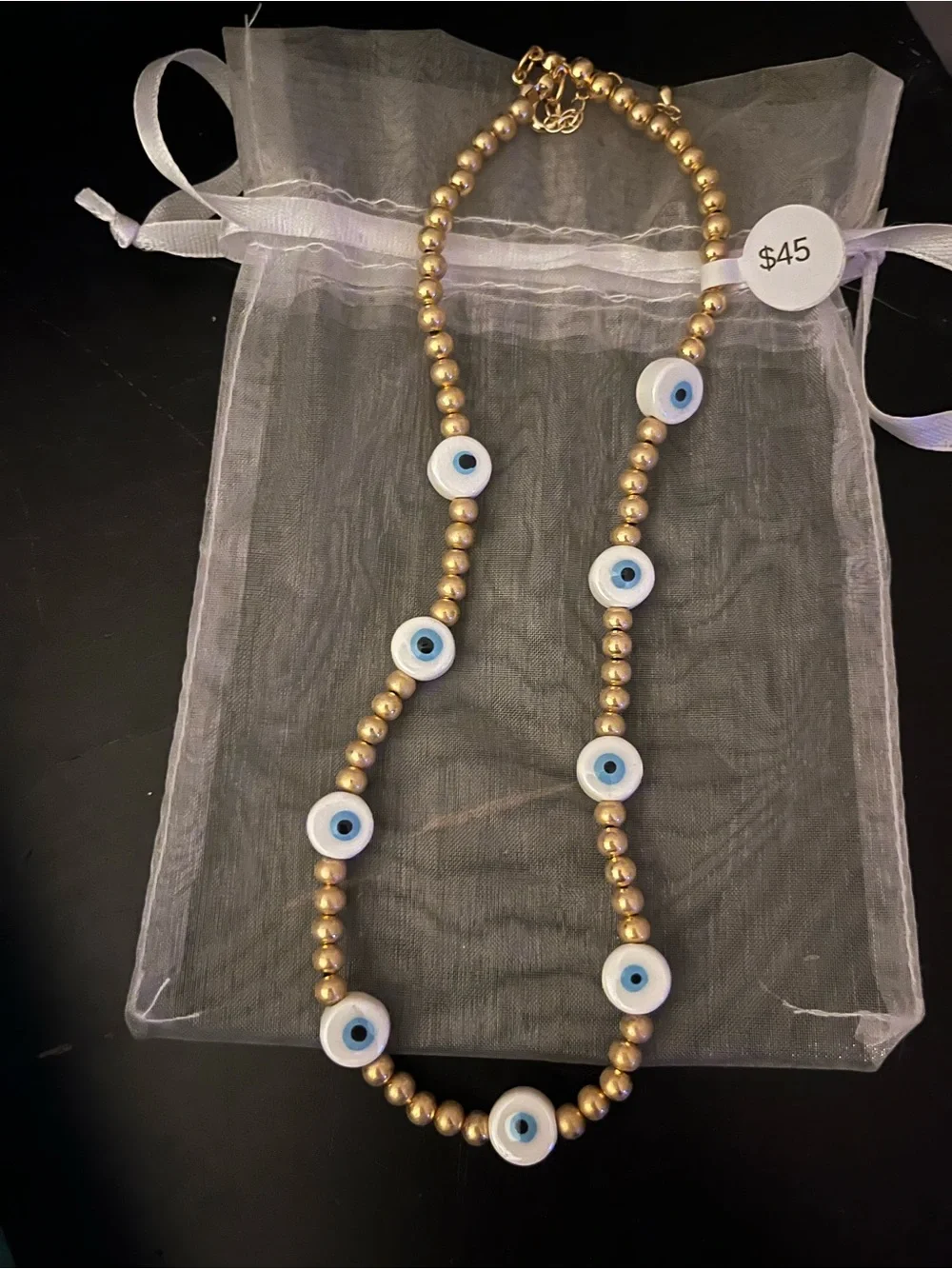 Gold Beaded Necklace with Blue Evil Eye Accents